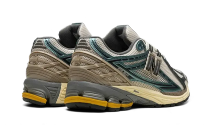 1906R Metallic Teal VOSneakers
