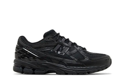 1906U Triple Black VOSneakers