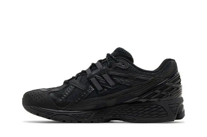 1906U Triple Black VOSneakers