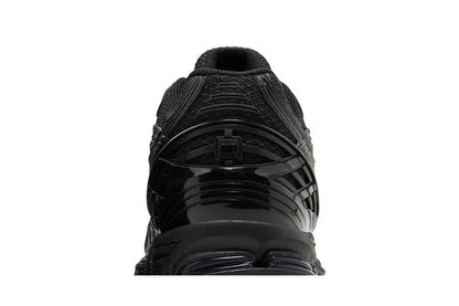 1906U Triple Black VOSneakers